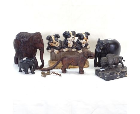 Painted cast-iron puppy doorstop, small Bison sculpture, dog nutcracker etc 