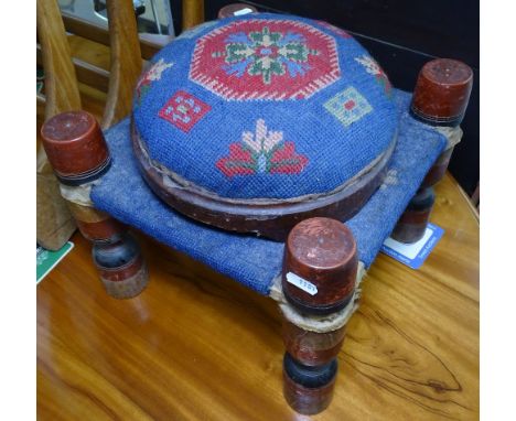 A Victorian button upholstered footstool, and similar stool 