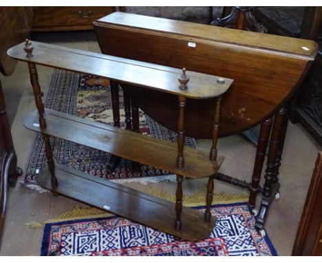 A Victorian mahogany Sutherland table, and a mahogany 3-tier hanging shelf 