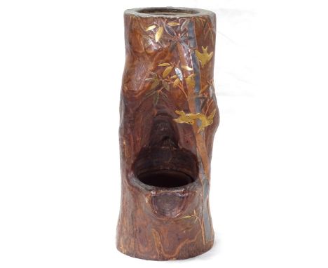 A Japanese carved painted and gilded log jardiniere planter, with tree and bird decoration, overall height 43cm 