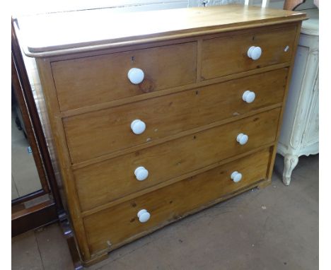 A Victorian pine chest of 2 short and 3 long drawers, with white ceramic handles, W117cm, H96cm 