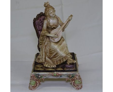 Royal Dux, study of a lady playing a lute, height 27.5cm 