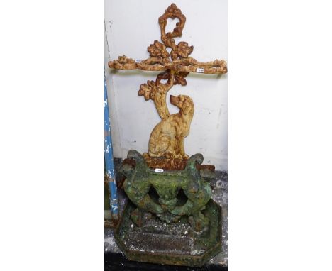 A Victorian cast-iron boot scraper, and a cast-iron stick stand 