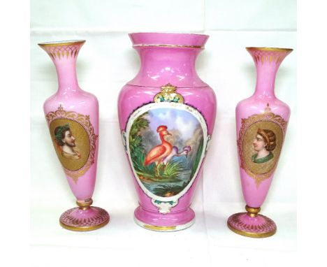 A pair of Continental pink glass vases with portrait decoration, 31cm, and a similar larger vase 