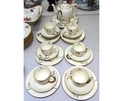 An Art Deco Royal Doulton bone china tea service for 6 people, including teapot, but lacking jug and sugar bowl 