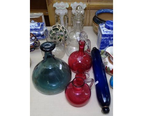 A pair of table lustres, 22.5cm, decanters, jugs and a Bristol blue glass rolling pin 