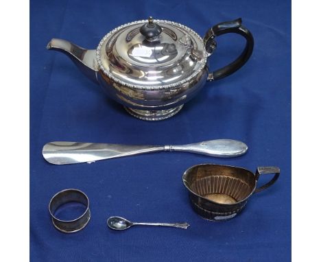 A single silver napkin ring, a silver-handled shoe horn, a Walker &amp; Hall plated teapot etc 