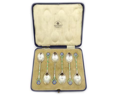 Set of six silver and enamel coffee spoons, with flower terminals by Mappin & Webb, Birmingham 1932, cased Condition Report C