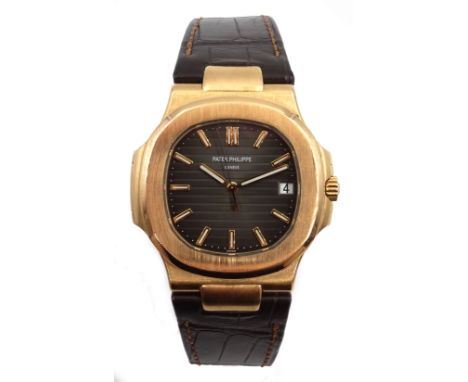 Patek Philippe Nautilus rare 18ct rose gold automatic wristwatch. Black brown dial, gold applied hour markers with luminescen