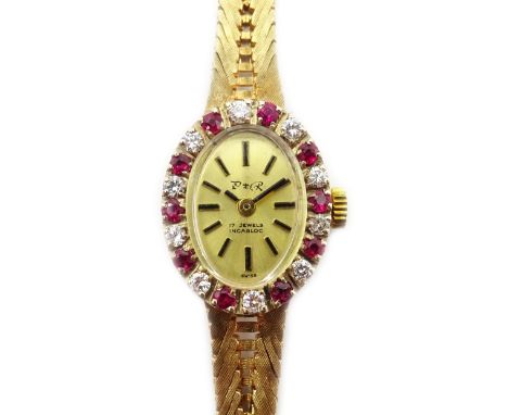 Ladies Swiss 9ct gold wristwatch, diamond and ruby bezel, London import marks  Condition Report Approx 14.7gm excluding movem