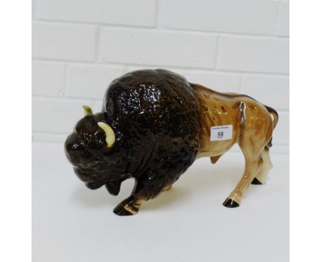 A Melba Ware Bison figure with printed backstamps, approx 35cm long 
