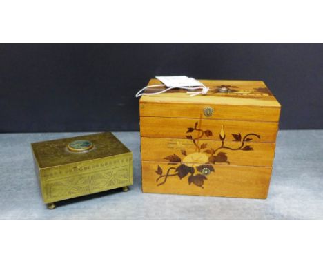 A wooden inlaid jewellery box depicting Mount Fuji and flowers with concertina opening action, together with a brass floral e