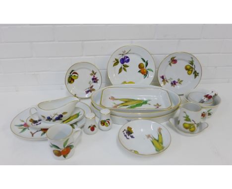 An extensive Royal Worcester 'Evesham' patterned dinner service comprising twelve dinner plates, eight medium plates, twelve 