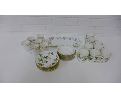 Wedgwood 'Wild Strawberry' patterned coffee cups and saucers, together with Royal Worcester 'Contessa' patterned cups and sau