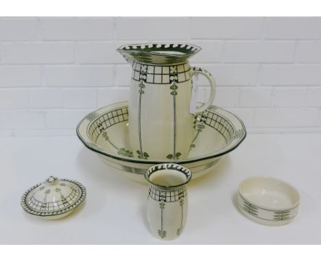 An Art Nouveau Royal Doulton toilet set decorated in the 'Caryl' pattern, comprising jug and basin, soap dish, small vase and