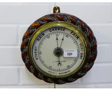 A Dobbie & Son of Glasgow oak cased aneroid wall barometer, diameter 25cm