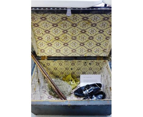 A mixed lot to include a domed black trunk containing a wig, shoes and epaulette, reputably the property of Lord James John C
