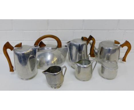 Picquot ware to include a kettle, teapot, two coffee pots, two cream jugs and a sugar bowl, (7) 