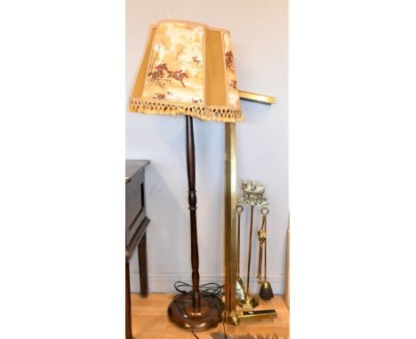 A turned wood standard lamp &amp; shade, together with an adjustable brass fender, fire irons &amp; stand. 