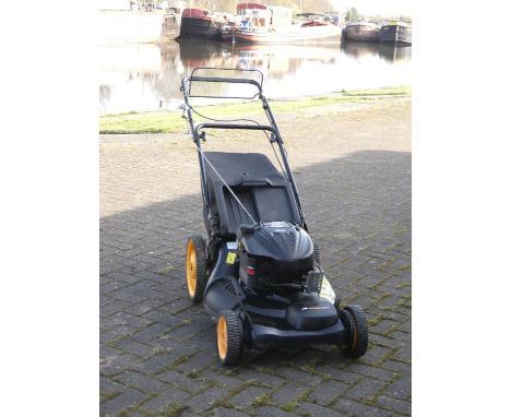 A petrol driven, self propelled  Mcculloch lawnmower, with a Briggs and Stratton 625E series engine, complete with grass box.