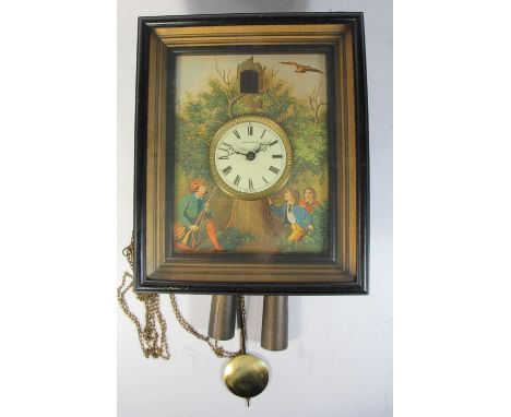 A mid 20th Century German mechanical picture frame wall clock, the face depicting scene of a hunter, above the 3.5" porcelain