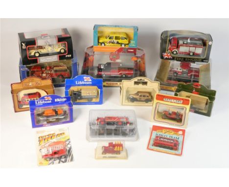 A collection of modern die cast emergency service vehicles to include, Teamsters, Corgi, Guisval, Pierce and others 