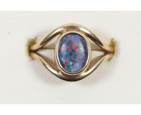 A 9ct gold mounted opal doublet ring, L, 3.2gm 