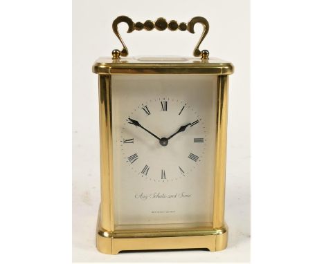 A brass cased manual wind carriage clock, jewelled striking to bell, movement stamped made in West Germany. 13cm tall. 