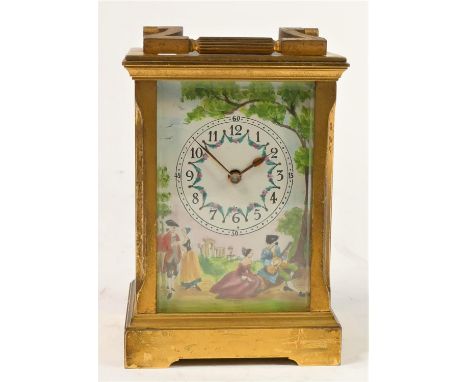 A Deacon manual wind carriage clock, gilt brass case with hand painted enamelled face, dial and side panels. Movement stamped
