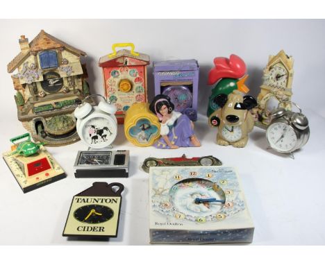 A collection of novelty clocks, to include a 1980s Kellogg's bedside alarm clock, a Disney 'Notre Dame' alarm clock, a Wesco 