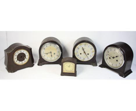 Five bakelite cased manual wind mantle clocks, together with a selection of electric and manual wind mantle clocks. (2) 