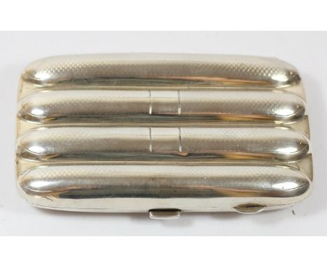 A silver four division cigar holder, Birmingham 1925, with engine turned decoration, gilt interior, 13 x 7.5 x2cm, 169gm 