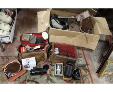 A BOX OF VINTAGE CAMERA ACCESSORIES TO INCLUDE LENSES, TRIPOD ETC. 