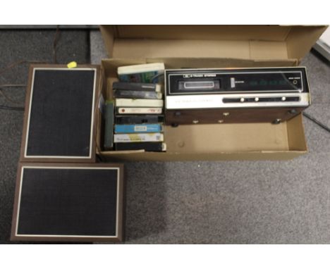 A VINTAGE TELETON STP812 8 TRACK STEREO WITH 8 TRACK TAPES AND SPEAKERS