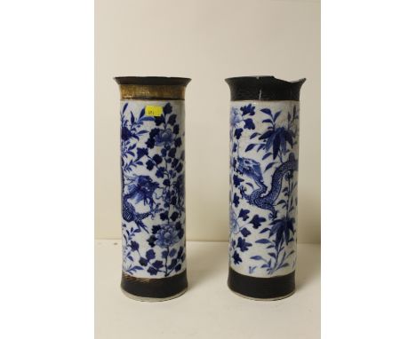 A PAIR OF LARGE BLUE AND WHITE ORIENTAL CERAMIC SLEEVE VASES A/F 