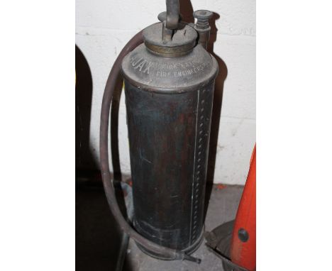 A VINTAGE AJAX FIRE EXTINGUISHER