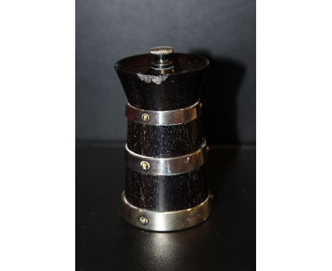 AN EBONY AND SILVER PLATED PEPPER GRINDER BY HUKIN AND HEATH S/D 