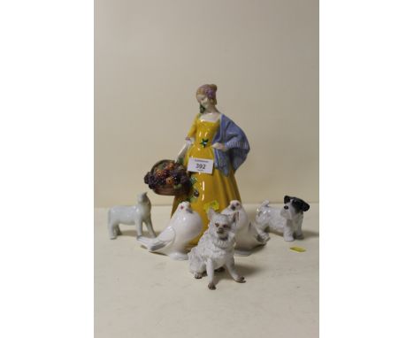 A COLLECTION OF CERAMIC FIGURES TO INCLUDE AN AUSTRIAN FIGURE OF A WOMAN HOLDING A BASKET OF FRUIT, DOG FIGURE ETC. (6)