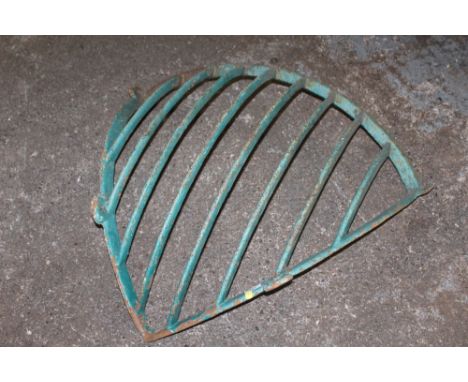 A VINTAGE CAST METAL HAY RACK S/D