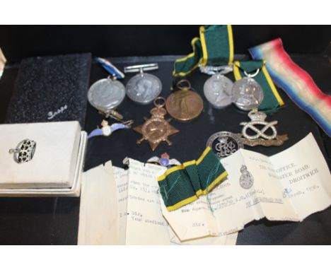 A COLLECTION OF WWI AND LATER MEDALS ETC. TO INCLUDE TERRITORIAL EFFICIENCY AND FOR EFFICIENT SERVICE MEDALS AWARDED TO 7765 