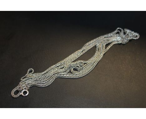 AN ANTIQUE SILVER MUFF CHAIN 