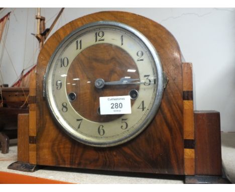 AN ART DECO WALNUT MANTLE CLOCK 