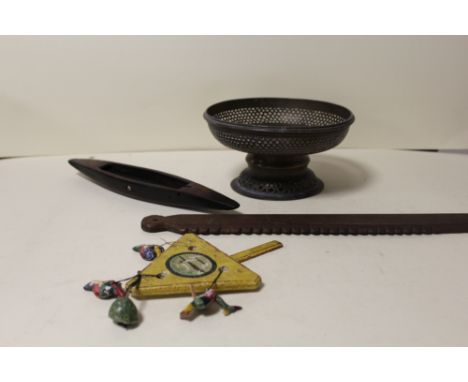 A MOROCCAN BRASS TAZZA. TWO ETHIOPEAN WOODEN WEAVING TOOLS AND A WOODEN PAINTED INDONESIAN CHILD'S TOY (3)