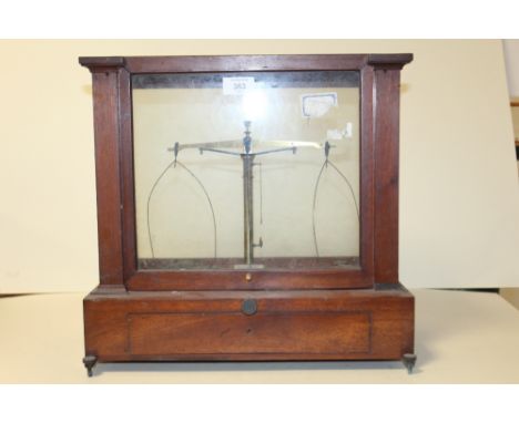 A MAHOGANY AND GLASS SET OF SCALES AND WEIGHTS BY BECKERS SONS OF ROTTERDAM 