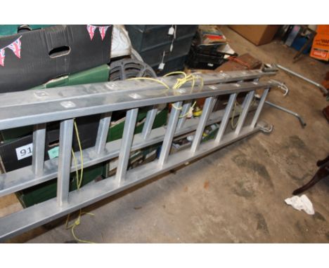 A LARGE SET OF STEP LADDERS