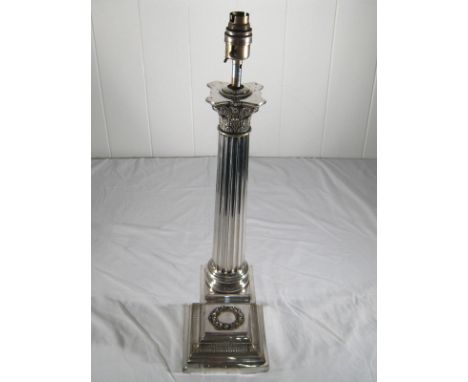 A large and impressive plated corinthian column table lamp on tall plinth and stepped square base, circa 1930. 16cm. square x