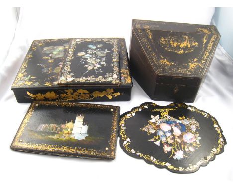 A gilt black lacquered writing box with abalone inlay, the lid forming a velvet lined slope, 31x26x6cm. high, two black lacqu