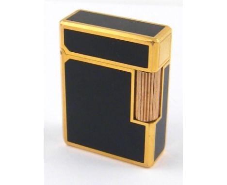 A lacquer and gold plate cigarette lighter by S.J. Dupont, Chinese character signature to lacquer, approx 4.5 x 3.5cm.
