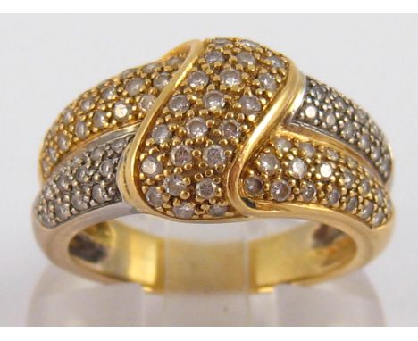 A yellow metal (tests 18 carat gold) diamond ring, estimated total diamond content 0.50ct. Size N, 6.8 gms.