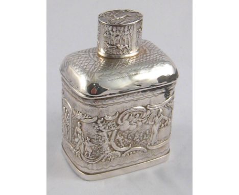 A Continental silver tea caddy with pull off measure cap, the sides embossed with the sacrifice of Isaac, the cap with a stag